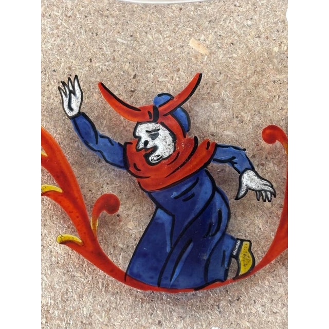 A very pretty and original enameled glass trinket tray, signed by Émile Gallé underneath and titled "C'est la Mère Michel"...