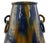 Vase with rings is an original decorative object realized in the first half of the 20th century. Original colored glazed...