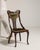 A classic side chair featuring a mahogany frame and upholstered seat, combining elegance with everyday functionality. The...