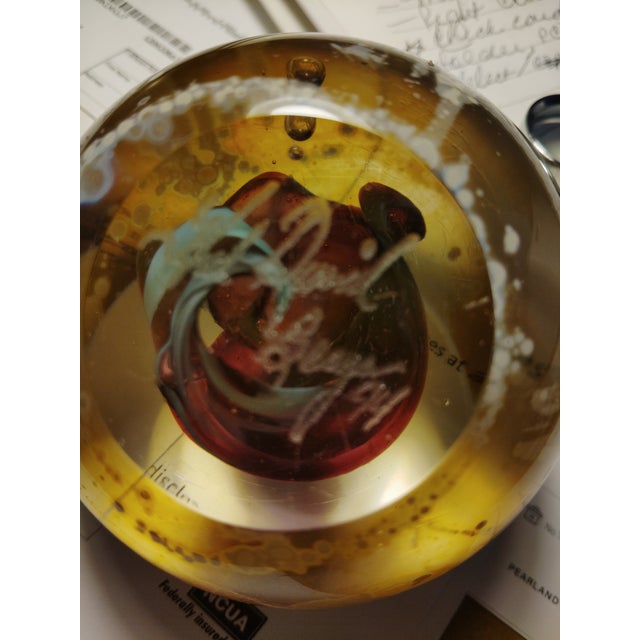 Signed David Berger 1994 art Glass with a glass sculpture inside the paperweight.