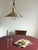 A classic Danish pendant lamp from the 1970s, in brushed brass-toned aluminum. It has a warm, soft golden finish with some...
