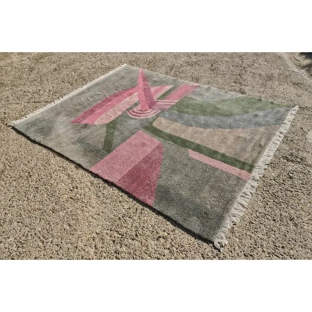 In this listing you will find a gorgeous Postmodern rug with abstract pattern. It features a beautiful palette of colours,...