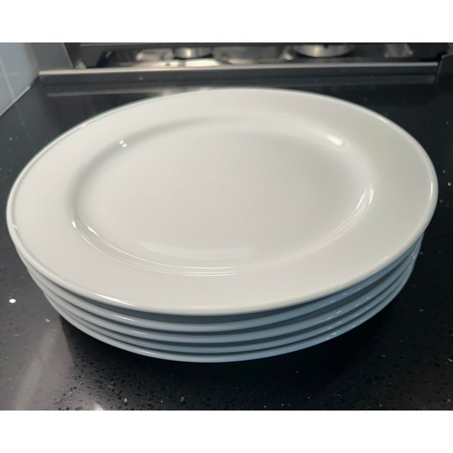 Pottery barn, great white rimmed large dinner plates. Large enough to use as a charger please see photos as these plates...