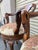 Priced to sell this week – open to serious offers. Beautiful pair of carved wood swivel bar stools in the style of...