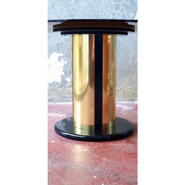 Round table dating back to the 60s in the style of Antonia Astori. Splendid amber temperate glass top. Very heavy...