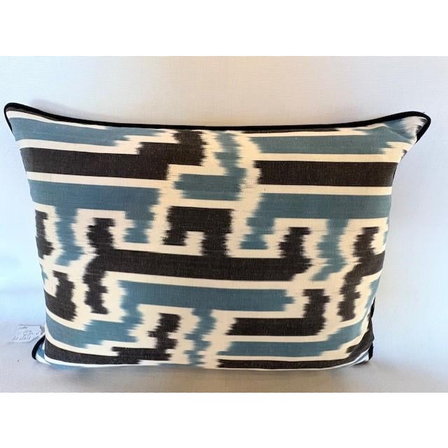 This charming pillow case from Les Ottomans features a floral design on silk velvet on the front, and a geometric pattern...