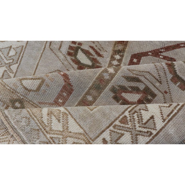 Vintage Turkish Oushak Unique Tribal Design in Earth Tones 3'5"x6'2" For Sale - Image 9 of 10