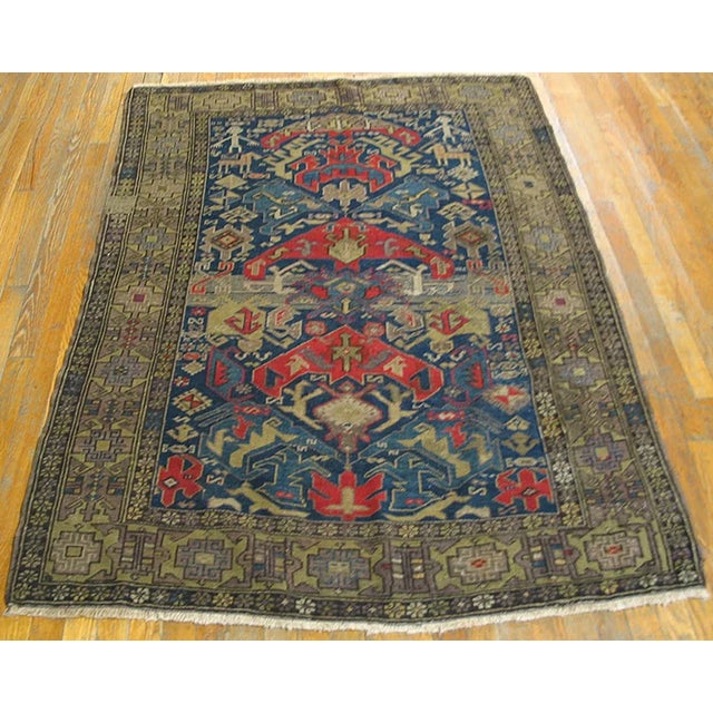 1930s Caucasian Rug ( 4' 2'' x 5' 9'' - 127 x 175 cm ) Antique Caucasian Blue 1930s Rug, Circa Date: 1930s. This...