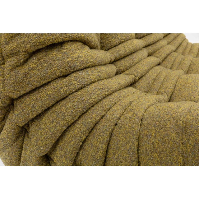 This Togo has been reupholstered with new foam and high-quality new fabric, keeping its inner structure, giving the item...