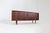 Vintage mid-century sideboard from the 1960s with sliding doors. The sideboard originates from Denmark, dating from the...