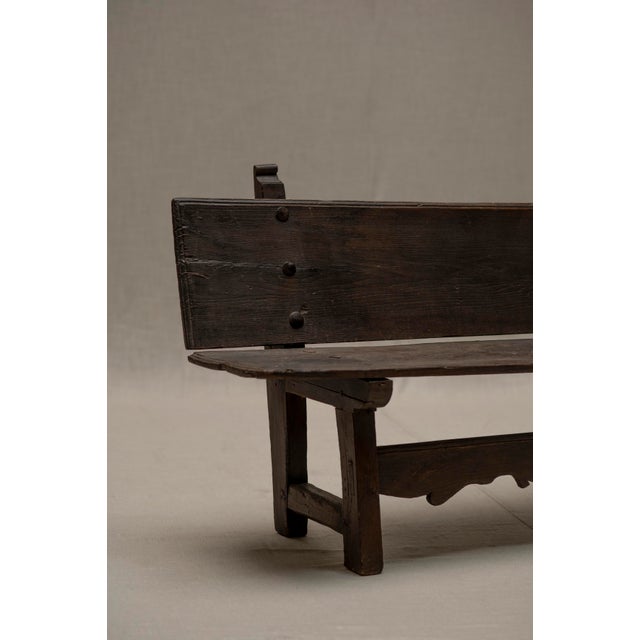 Large vintage hallway bench. Made out of solid wood. Sculptural carvings and details plus a lot of texture and character....