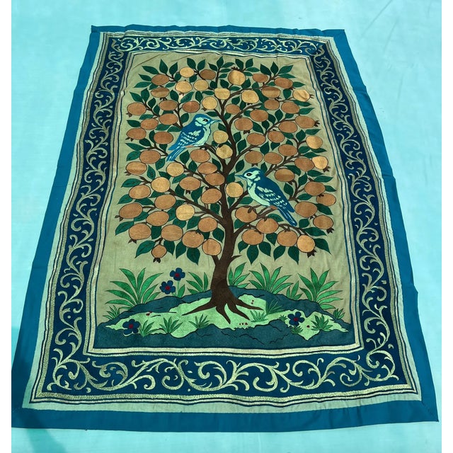 Bring timeless artistry and soulful color into your space with this authentic vintage Indian silk embroidered wall...