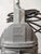 A 1950s philips hdk series factory pendant light in black enamel with a cast aluminum top, made in the netherlands. This...