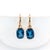 These beautiful lever back earrings feature a pair of 16.45 carat weight oval London Blue Topaz solitaires set in solid...