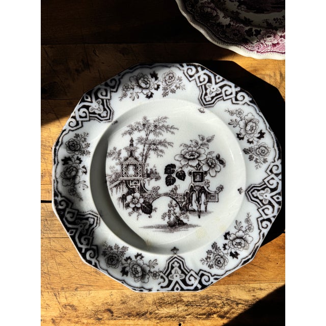 Gorgeous 1847 black, or Mulberry, ironstone transferware dinner plate. This piece has a really nice weight to it and is in...