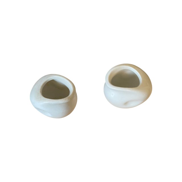A pair of white individual creamer/condiment/syrup/dressing pitchers from Mexican pottery Anfora. Made in the 1950s or 60s...