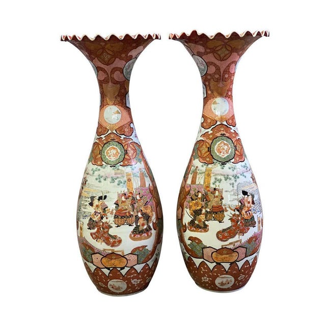 A pair of delightful 19th century antique vases, with globular body opening into ruffled rim with various flower heads...