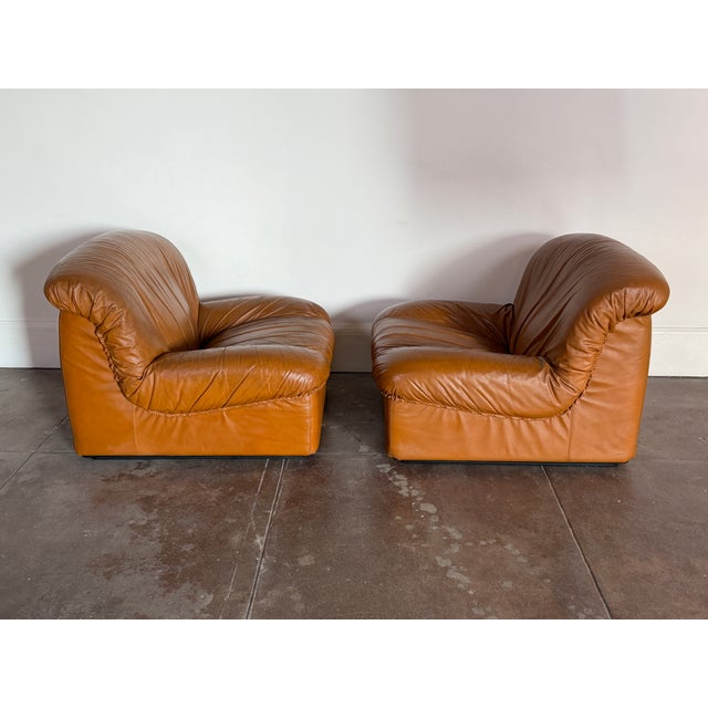 1970s Italian modular “Giusy” sofa chairs and coffee table by Neoflex in leather, in good vintage condition. Signed. 33” x...