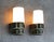 A rare pair of swedish mid-century ifö 6081 wall lights, dating from the 1970s. Sculptural glazed porcelain wall mounts in...