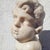17th Century White Marble Putto Head on a Column For Sale - Image 9 of 18