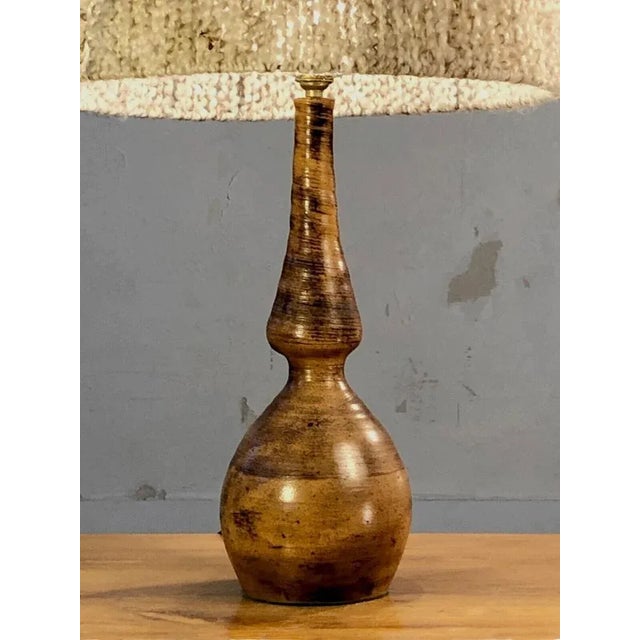 A spectacular and sensual table lamp, post-modernist, brutalist, popular art, shabby-chic, modern rustic, with a libre-...