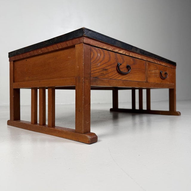 A compact low table with a calm, balanced shape and an easy-to-use size that works in many settings: next to a sofa, in a...