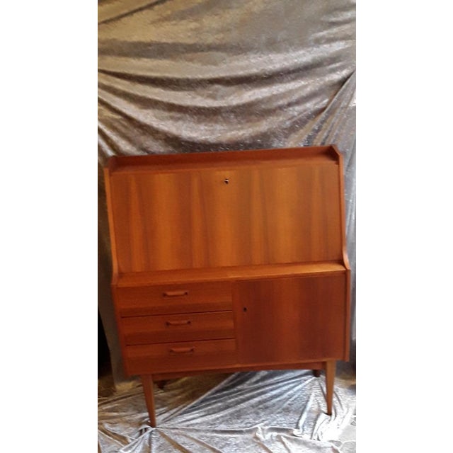 Vintage Scandinavian Secretary with Writing Flap, 3 Drawers & Door in Teak, 1963, in Very Good conditions. Designed 1960...