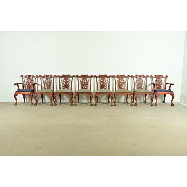 An outstanding set of eight Chippendale or Georgian style dining chairs In the manner of Baker Furniture USA, Circa 1980s...