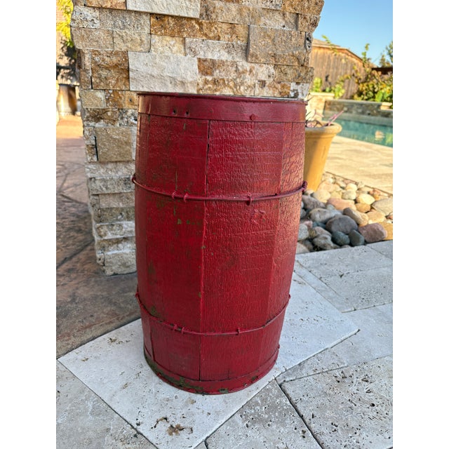 This charming antique wooden nail barrel features its original deep red paint, full of rustic texture and authentic patina...