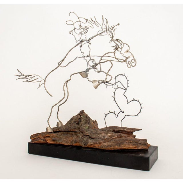 Ted Weidhaas (German/American, XX) "T.N.T. Tom Mix and Tony" Cowboy Caricature Steel Wire Sculpture, depicting a horse and...