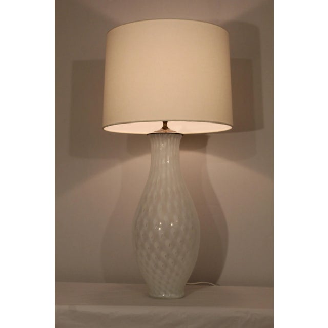 White on white Murano glass. Sculptural shape. Beautiful wave pattern in glass, captures light and creates a glowing...