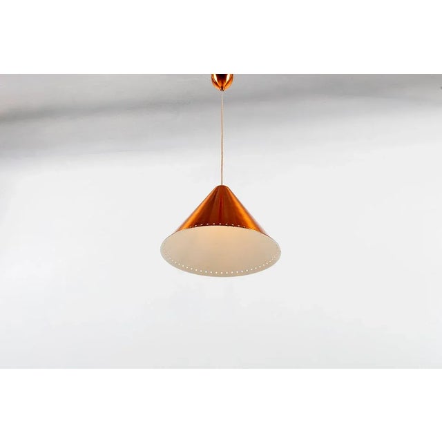 This Kegle model pendant was designed by Bent Karlby and produced by from Lyfa in Denmark in the 1960s. It is made of...