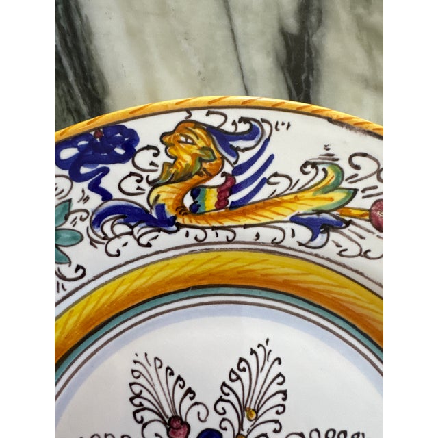 Presenting a set of 6 hand painted and glazed plates made in Italy. Functional or as wall art, they have holes for...
