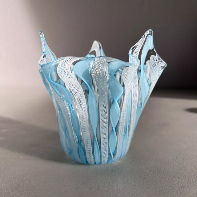 A beautiful example of Venetian artistry, this Murano glass handkerchief vase features the iconic freeform ruffled rim...