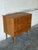 This classic oak dresser features four spacious drawers and clean architectural lines. Elevated on slender tapered legs,...