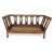 Beautifully carved antique European daybed with cane seat. The simple elegant design makes this piece timeless. It could...