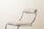 Set of four chairs with a tubular steel frame and white suede upholstery, featuring a cantilever or free-hanging design,...