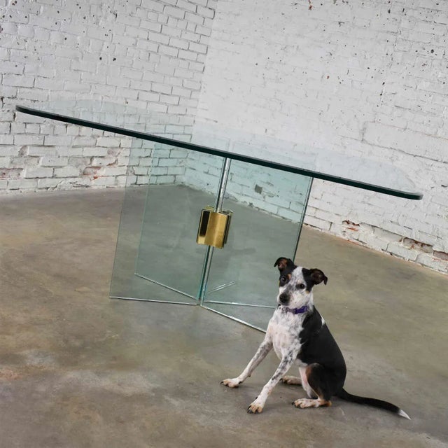 Phenomenal all glass modern dining table attributed to The Pace Collection with only a single brass plated connector on...