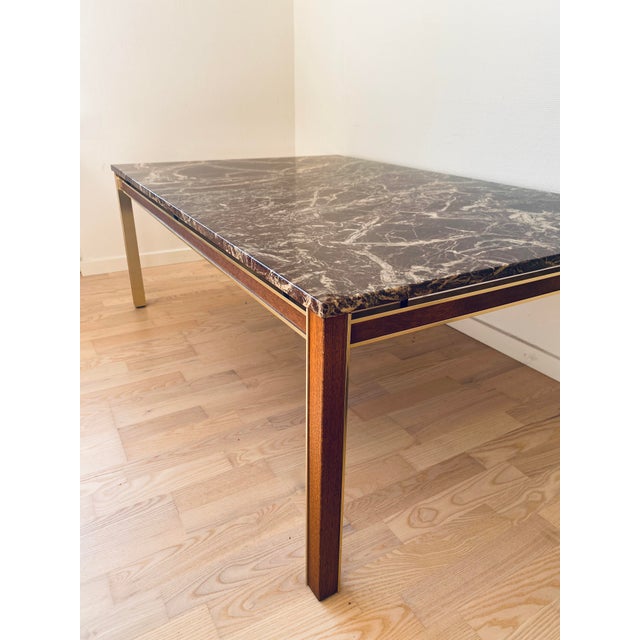 Elegant coffee table by Bendixen Design, probably from the 1960s to 1970s design period. The table combines fine materials...