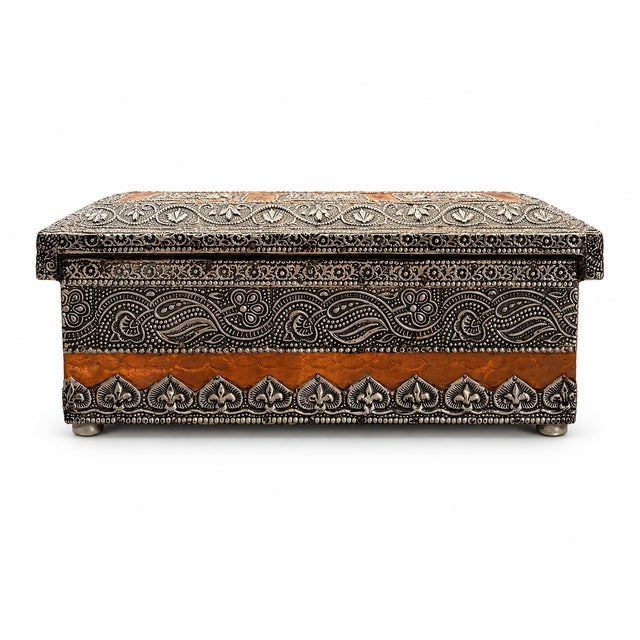 Sourced from Santa Barbara, California, this large 13.5-inch vintage 1970s Indian jewelry chest features an intricately...