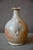 This beautifully worked ceramic pitcher is stamped with the pottery sandstones of the marsh. Its collar is nicely open and...