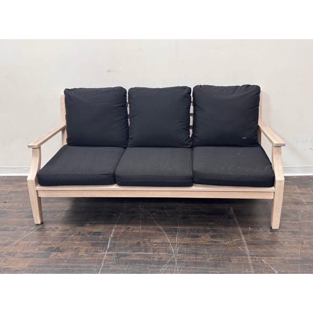 Design Plus Gallery presents the Belmont Outdoor Sofa from Pottery Barn. This outdoor sofa has a natural wood frame with a...
