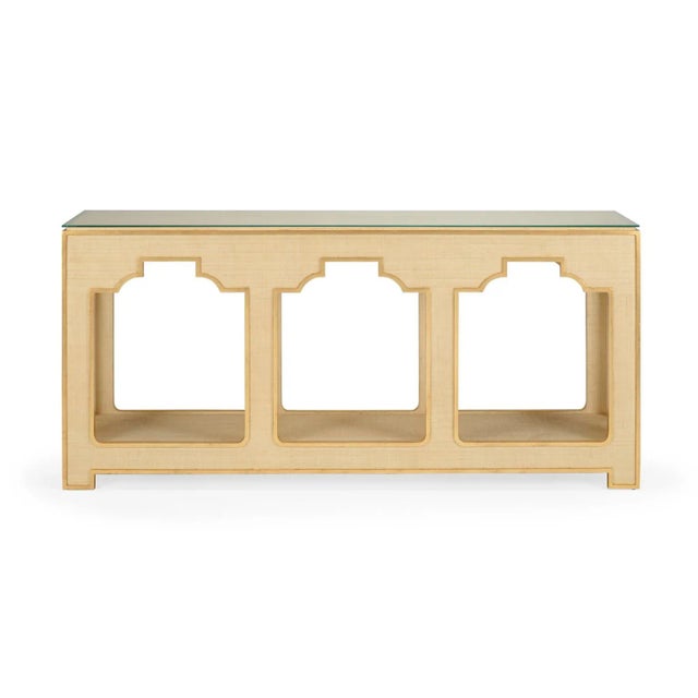 Cream Colored Raffia Console With Gold Accents And A Tempered Glass Top, Designed By Jamie Merida. Clean with a dry cloth