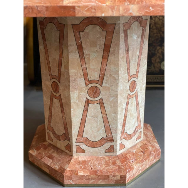 Absolutely stunning dining table from the 80s. It is made of tessellated fossilized coral in a beautiful floral pattern....