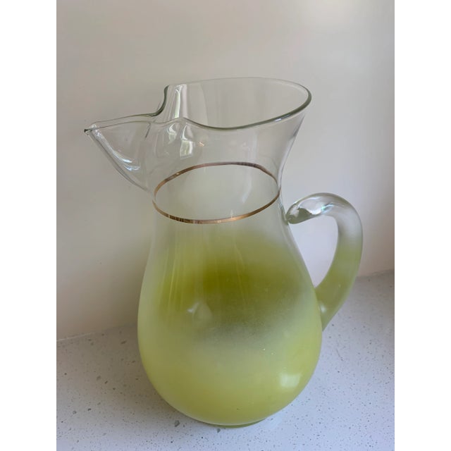 Mid Century Blendo Pitcher In a yellow green or chartreuse fade with gold band. Large 10” tall