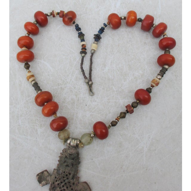 Assembled Middle-Eastern design necklace with amber and glass beads. A Coptic/Ethiopian cross drop. The cross is low-grade...