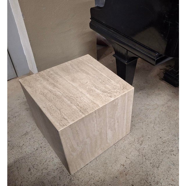 Italian travertine coffee table or pedestal, beautifully veined, the complex color enhanced by the irregular natural...
