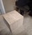 Italian travertine coffee table or pedestal, beautifully veined, the complex color enhanced by the irregular natural...