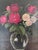 This original vintage oil painting, created around 1930, shows a bouquet of red and pink roses arranged in a clear glass...