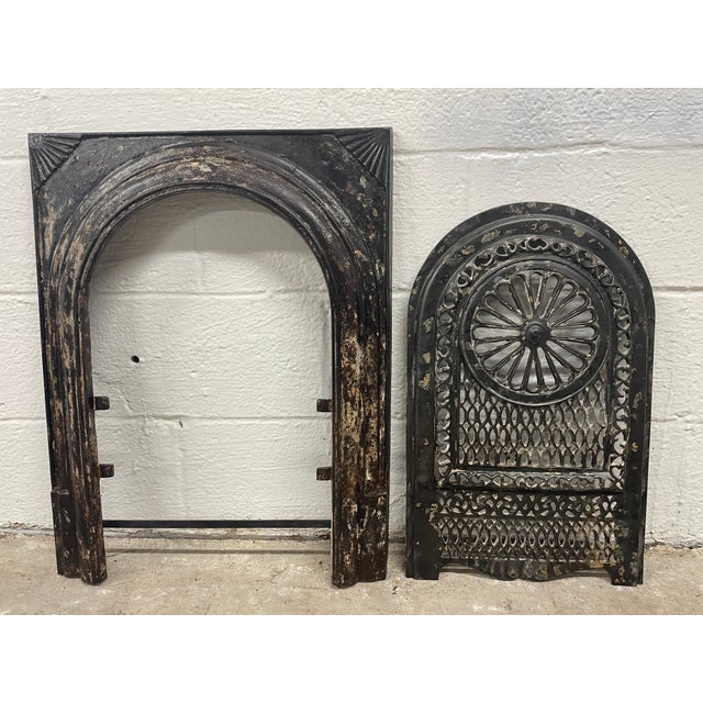 Beautiful design fireplace insert and surround with intricate fretwork. Add timeless charm to your home with this...